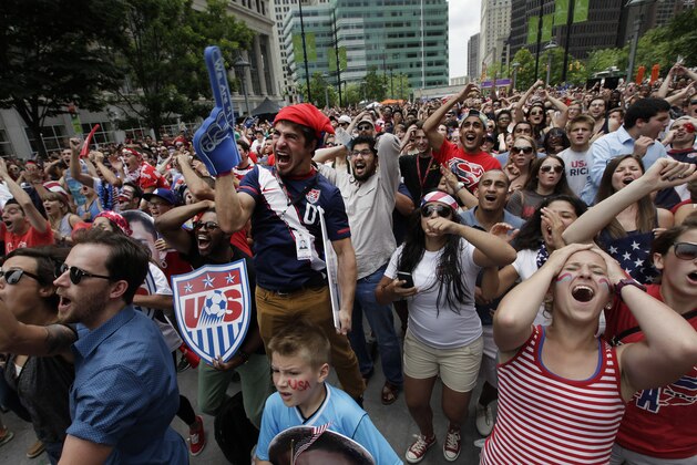 United States fans react while watching the final minutes of the 2014 World Cup soccer match between the United States and Germany at a public viewing party, in Detroit, Thursday, June 26, 2014. Germany defeated the United States 1-0 to win Group G ahead of the Americans, who also advanced to the knockout stage of the World Cup despite losing. (AP Photo/Paul Sancya)