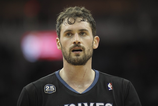 Mar 20, 2014; Houston, TX, USA; Minnesota Timberwolves forward Kevin Love (42) on the court during the third quarter against the Houston Rockets at Toyota Center. Mandatory Credit: Andrew Richardson-USA TODAY Sports