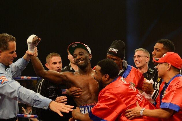 GLASGOW, SCOTLAND - MARCH 1 :  Terence Crawford celebrates his victory over Rick Burns during the WBO World Lightweight Championship Boxing match at the Glasgow SECC on March 1 2014 in Glasgow, Scotland. (Photo by Mark Runnacles/Getty Images)