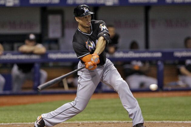 Miami Marlins' Giancarlo Stanton grounds out against the Tampa Bay Rays during the eighth inning of an interleague baseball game Thursday, June 5, 2014, in St. Petersburg, Fla. (AP Photo/Chris O'Meara)
