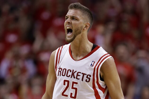 Houston Rockets' Chandler Parsons (25) reacts after making a three-point basket against the Portland Trail Blazers during the second quarter in Game 1 of an opening-round NBA basketball playoff series Sunday, April 20, 2014, in Houston. (AP Photo/David J. Phillip)