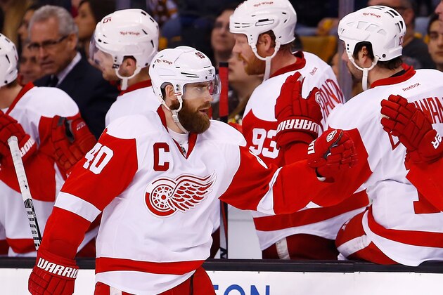BOSTON, MA - APRIL 26: Henrik Zetterberg #40 of the Detroit Red Wings is congratulated by his teammates following his goal in the third period against the Boston Bruins in Game Five of the First Round of the 2014 NHL Stanley Cup Playoffs at TD Garden on April 26, 2014 in Boston, Massachusetts. (Photo by Jared Wickerham)  (Photo by Jared Wickerham/Getty Images)