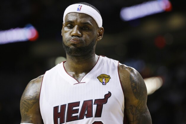 Miami Heat forward LeBron James (6) reacts during the second half in Game 4 of the NBA basketball finals against the San Antonio Spurs, Thursday, June 12, 2014, in Miami.  (AP Photo/Lynne Sladky)