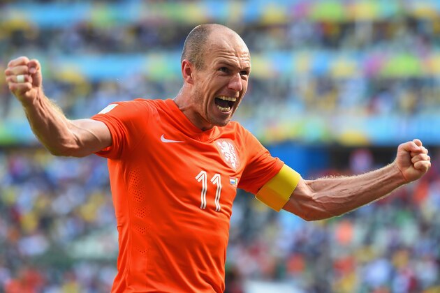 FORTALEZA, BRAZIL - JUNE 29:  Arjen Robben of the Netherlands celebrates after defeating Mexico 2-1 during the 2014 FIFA World Cup Brazil Round of 16 match between Netherlands and Mexico at Castelao on June 29, 2014 in Fortaleza, Brazil.  (Photo by Laurence Griffiths/Getty Images)