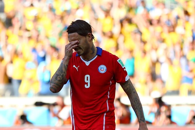 BELO HORIZONTE, BRAZIL - JUNE 28:  Mauricio Pinilla of Chile reacts after being defeated by Brazil in a penalty shootout during the 2014 FIFA World Cup Brazil round of 16 match between Brazil and Chile at Estadio Mineirao on June 28, 2014 in Belo Horizonte, Brazil.  (Photo by Jeff Gross/Getty Images)