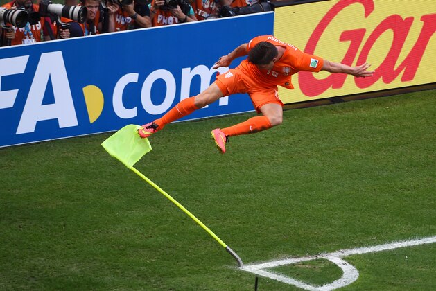 FORTALEZA, BRAZIL - JUNE 29:  Klaas-Jan Huntelaar of the Netherlands celebrates scoring his team's second goal on a penalty kick in stoppage time during the 2014 FIFA World Cup Brazil Round of 16 match between Netherlands and Mexico at Castelao on June 29, 2014 in Fortaleza, Brazil.  (Photo by Jamie McDonald/Getty Images)