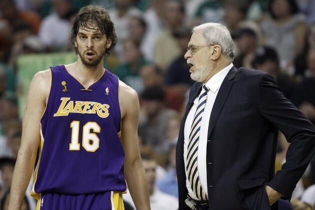 Los Angeles Lakers coach Phil Jackson talks to Pau Gasol (16) during a time out in Game 2 of the NBA basketball finals against the Boston Celtics Sunday, June 8, 2008, in Boston. (AP Photo/Winslow Townson)