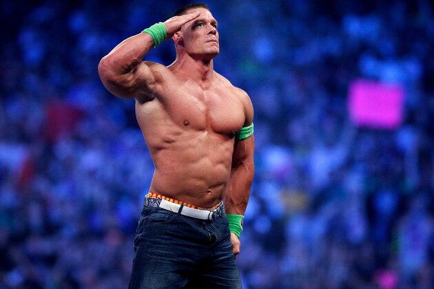 John Cena celebrates his win during Wrestlemania XXX at the Mercedes-Benz Super Dome in New Orleans on Sunday, April 6, 2014. (Jonathan Bachman/AP Images for WWE)