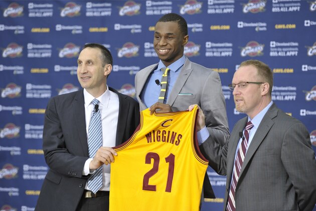 INDEPENDENCE, OH - JUNE 27:  First overall draft pick Andrew Wiggins of the Cleveland Cavaliers is introduced to the media alongside Head Coach David Blatt and General Manager David Griffin at The Cleveland Clinic Courts on June 27, 2014 in Independence, Ohio in Cleveland, Ohio. NOTE TO USER: User expressly acknowledges and agrees that, by downloading and/or using this Photograph, user is consenting to the terms and conditions of the Getty Images License Agreement. Mandatory Copyright Notice: Copyright 2014 NBAE (Photo by David Liam Kyle/NBAE via Getty Images)