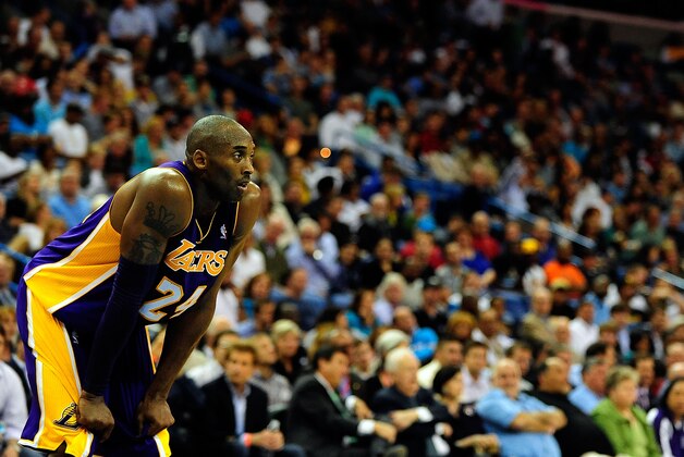 NEW ORLEANS, LA - DECEMBER 05:  Kobe Bryant #24 of the Los Angeles Lakers waits for a play against the New Orleans Hornets at the New Orleans Arena on December 5, 2012 in New Orleans, Louisiana. Bryant scored his 30,000th point in tonight's game making him the fifth player in NBA history to reach the achievement.  NOTE TO USER:  User expressly acknowledges and agrees that, by downloading and or using this photograph, User is consenting to the terms and conditions of the Getty Images License Agreement.  (Photo by Stacy Revere/Getty Images)