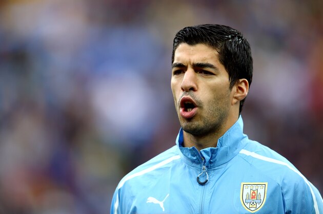 SAO PAULO, BRAZIL - JUNE 19:  Luis Suarez of Uruguay sings the National Anthem before the 2014 FIFA World Cup Brazil Group D match between Uruguay and England at Arena de Sao Paulo on June 19, 2014 in Sao Paulo, Brazil.  (Photo by Julian Finney/Getty Images)