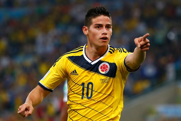 RIO DE JANEIRO, BRAZIL - JUNE 28:  James Rodriguez of Colombia celebrates scoring his team's second goal and his second of the game during the 2014 FIFA World Cup Brazil round of 16 match between Colombia and Uruguay at Maracana on June 28, 2014 in Rio de Janeiro, Brazil.  (Photo by Clive Rose/Getty Images)