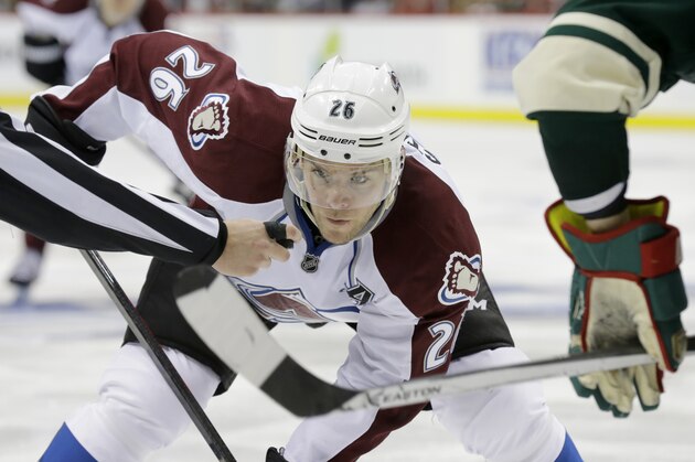 Colorado Avalanche center Paul Stastny (26) keeps his eyes on the puck in a face-off during the second period of Game 3 of an NHL hockey first-round playoff series against the Minnesota Wild in St. Paul, Minn., Monday, April 21, 2014. (AP Photo/Ann Heisenfelt) Colorado Avalanche center Paul Stastny (26) keeps his eyes on the puck in a face-off during the second period of Game 3 of an NHL hockey first-round playoff series against the Minnesota Wild in St. Paul, Minn., Monday, April 21, 2014. (AP Photo/Ann Heisenfelt)