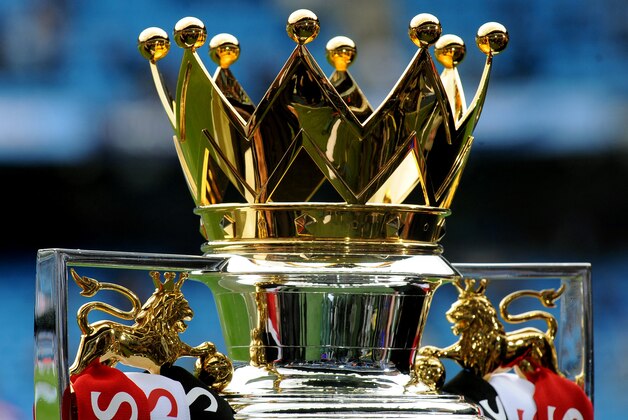 Premier League trophy seen before the English Premier League soccer match between Manchester City and West Ham United at the Etihad Stadium,  Manchester, England, Sunday, May 11, 2014. (AP Photo/Rui Vieira)