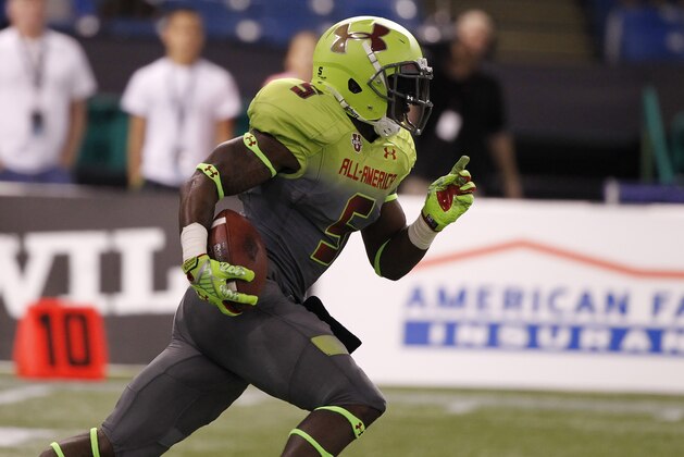 Jan 2, 2014; St. Petersburg, FL, USA; Team Nitro cornerback Jabrill Peppers (5) runs with the ball during a punt during the second half at Tropicana Field. Team Highlight defeated the Team Nitro 31-21. Mandatory Credit: Kim Klement-USA TODAY Sports