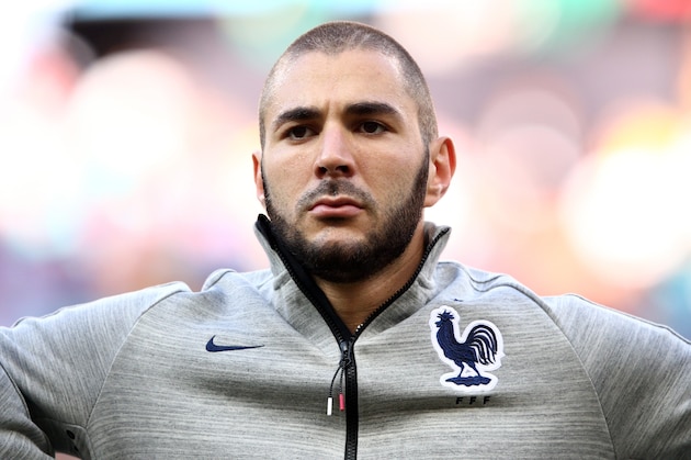 SALVADOR, BRAZIL - JUNE 20: Karim Benzema of France looks on during the National Anthems prior to the 2014 FIFA World Cup Brazil Group E match between Switzerland and France at Arena Fonte Nova on June 20, 2014 in Salvador, Brazil.  (Photo by Adam Pretty/Getty Images)