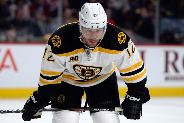 Mar 12, 2014; Montreal, Quebec, CAN; Boston Bruins forward Jarome Iginla (12) gets ready for a faceoff during the first period against the Montreal Canadiens at the Bell Centre. The Boston Bruins defeated the Montreal Canadiens 4-1. Mandatory Credit: Eric Bolte-USA TODAY Sports