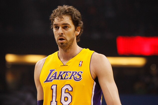 Jan 24, 2014; Orlando, FL, USA; Los Angeles Lakers center Pau Gasol (16) against the Orlando Magic during the first quarter at Amway Center. Mandatory Credit: Kim Klement-USA TODAY Sports