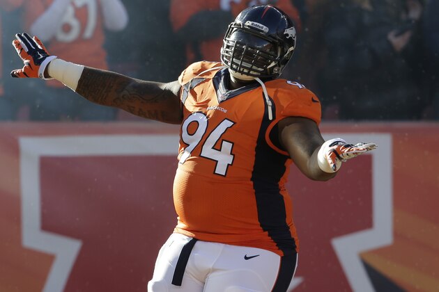 Denver Broncos defensive tackle Terrance Knighton takes the field before playing against the San Diego Chargers in an NFL AFC division playoff football game, Sunday, Jan. 12, 2014, in Denver. (AP Photo/Joe Mahoney)