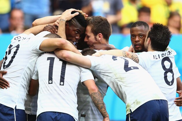 BRASILIA, BRAZIL - JUNE 30:  Paul Pogba of France celebrates scoring his team's first goal with teammates during the 2014 FIFA World Cup Brazil Round of 16 match between France and Nigeria at Estadio Nacional on June 30, 2014 in Brasilia, Brazil.  (Photo by Paul Gilham/Getty Images)