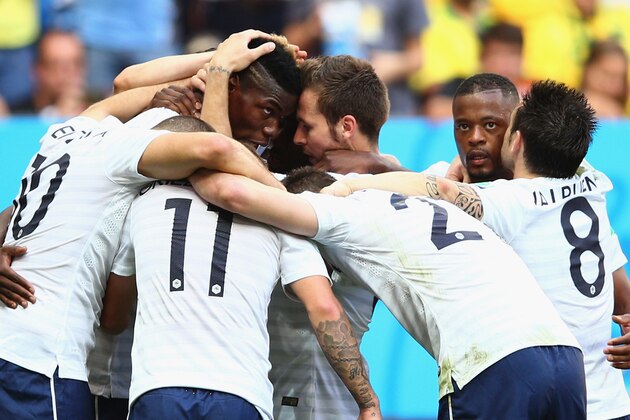 BRASILIA, BRAZIL - JUNE 30:  Paul Pogba of France celebrates scoring his team's first goal with teammates during the 2014 FIFA World Cup Brazil Round of 16 match between France and Nigeria at Estadio Nacional on June 30, 2014 in Brasilia, Brazil.  (Photo by Paul Gilham/Getty Images)