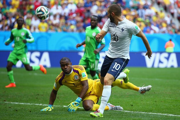 BRASILIA, BRAZIL - JUNE 30:  Karim Benzema of France shoots against Vincent Enyeama of Nigeria during the 2014 FIFA World Cup Brazil Round of 16 match between France and Nigeria at Estadio Nacional on June 30, 2014 in Brasilia, Brazil.  (Photo by Paul Gilham/Getty Images)