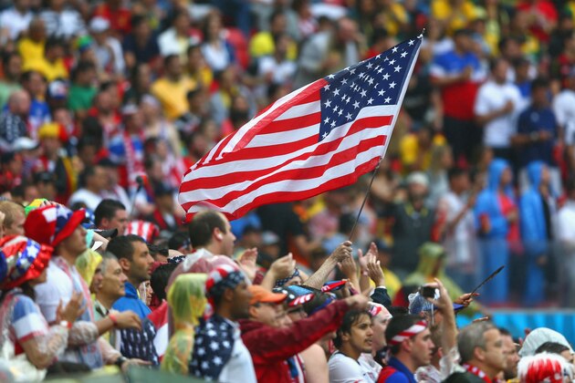 RECIFE, BRAZIL - JUNE 26: United States fans cheer during the 2014 FIFA World Cup Brazil group G match between the United States and Germany at Arena Pernambuco on June 26, 2014 in Recife, Brazil.  (Photo by Michael Steele/Getty Images)