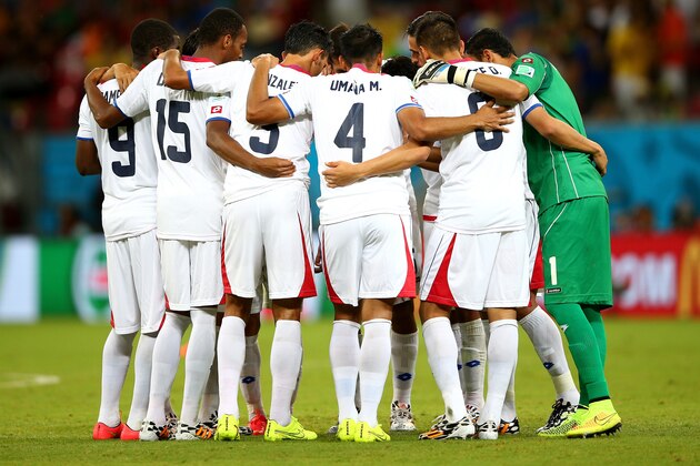 RECIFE, BRAZIL - JUNE 29: Costa Rica huddle before the start of the second half during the 2014 FIFA World Cup Brazil Round of 16 match between Costa Rica and Greece at Arena Pernambuco on June 29, 2014 in Recife, Brazil.  (Photo by Paul Gilham/Getty Images)