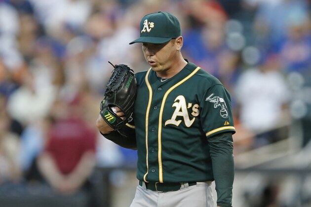 Oakland Athletics starting pitcher Scott Kazmir reacts after allowing a second-king solo home run to New York Mets Chris Young in an inter-league baseball game in New York, Tuesday, June 24, 2014. The Athletics lost 10-1 to the Mets after Kazmir allowed seven runs on eight hits in three innings. (AP Photo/Kathy Willens)