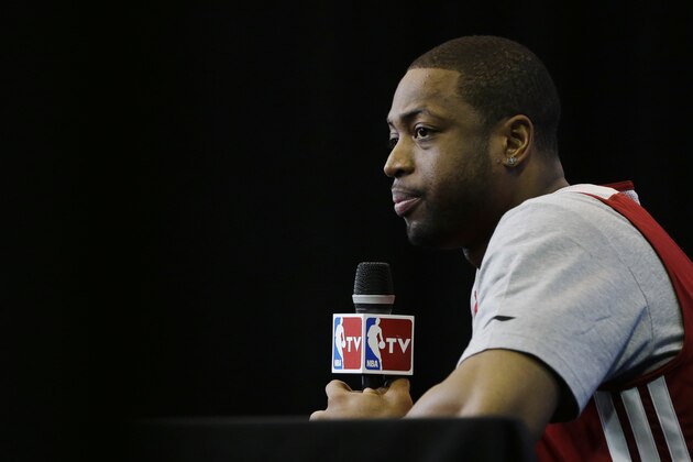 Miami Heat guard Dwyane Wade listens to a question during a media availability for the NBA basketball finals on Saturday, June 14, 2014, in San Antonio. Miami plays Game 5 against the San Antonio Spurs on Sunday. (AP Photo/David J. Phillip)