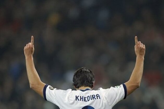 Real Madrid's Sami Khedira from Germany celebrates after scoring a goal during a Copa del Rey soccer match against Celta de Vigo at the Santiago Bernabeu stadium in Madrid, Wednesday, Jan. 9, 2013. (AP Photo/Daniel Ochoa de Olza)