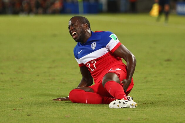 NATAL, BRAZIL - JUNE 16:  An injured Jozy Altidore of the United States lies on the field during the 2014 FIFA World Cup Brazil Group G match between Ghana and the United States at Estadio das Dunas on June 16, 2014 in Natal, Brazil.  (Photo by Michael Steele/Getty Images)