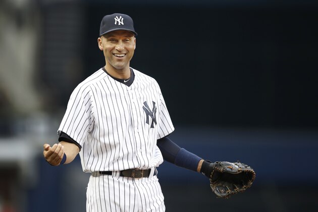 New York Yankees shortstop Derek Jeter reacts to a coach while waiting for the start of a baseball game against the Oakland Athletics at Yankee Stadium in New York, Wednesday, June 4, 2014. (AP Photo/Kathy Willens) New York Yankees shortstop Derek Jeter reacts to a coach while waiting for the start of a baseball game against the Oakland Athletics at Yankee Stadium in New York, Wednesday, June 4, 2014. (AP Photo/Kathy Willens)