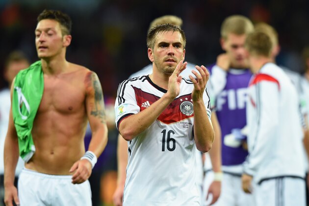 PORTO ALEGRE, BRAZIL - JUNE 30:  Philipp Lahm of Germany acknowledges the crowd after defeating Algeria 2-1 during the 2014 FIFA World Cup Brazil Round of 16 match between Germany and Algeria at Estadio Beira-Rio on June 30, 2014 in Porto Alegre, Brazil.  (Photo by Matthias Hangst/Getty Images)