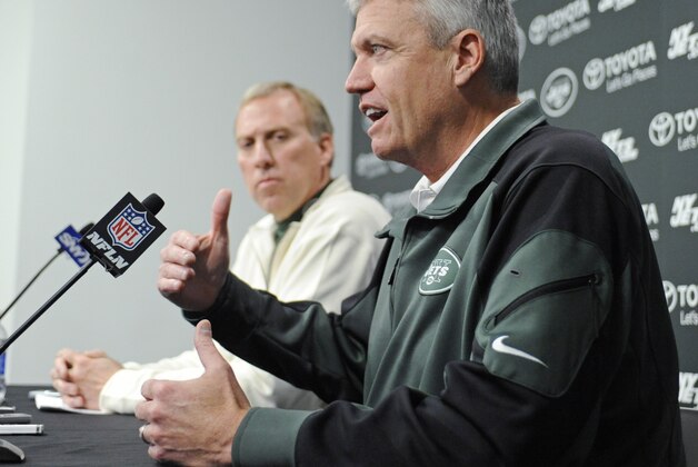 New York Jets coach Rex Ryan, right, and general manager John Idzik speak to the media  during an NFL football news conference Tuesday, Dec. 31, 2013, in Florham Park, N.J. (AP Photo/Bill Kostroun)
