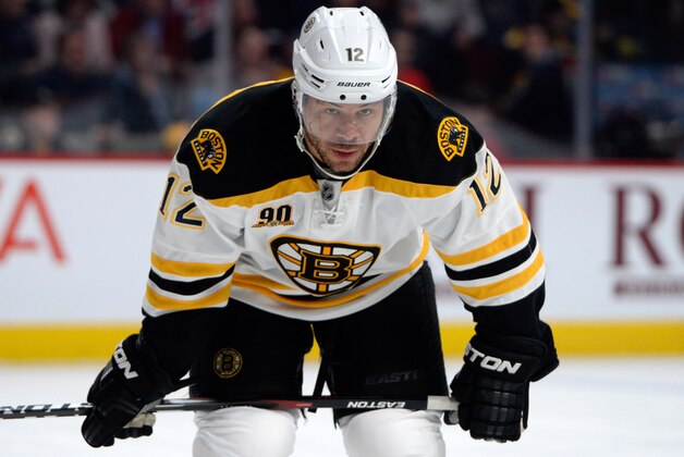 Mar 12, 2014; Montreal, Quebec, CAN; Boston Bruins forward Jarome Iginla (12) gets ready for a faceoff during the first period against the Montreal Canadiens at the Bell Centre. The Boston Bruins defeated the Montreal Canadiens 4-1. Mandatory Credit: Eric Bolte-USA TODAY Sports