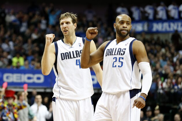 Dallas Mavericks forward Dirk Nowitzki (41) of Germany, and guard Vince Carter (25) during the first half of an NBA basketball game against the Los Angeles Clippers Friday, Jan. 3, 2014, in Dallas. (AP Photo/Sharon Ellman)