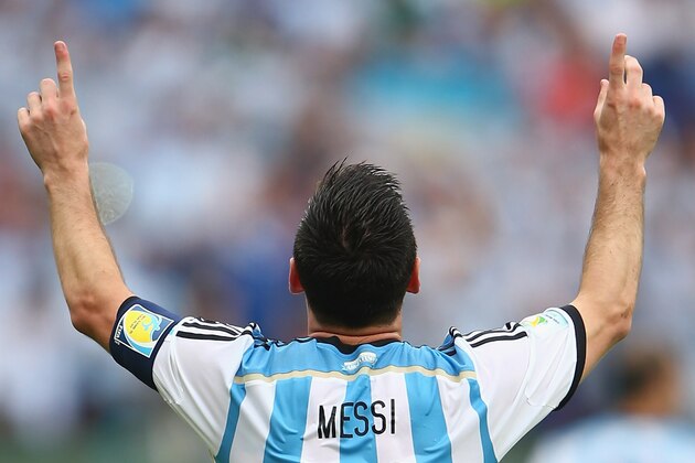 PORTO ALEGRE, BRAZIL - JUNE 25:  Lionel Messi of Argentina celebrates scoring his team's second goal and his second of the game during the 2014 FIFA World Cup Brazil Group F match between Nigeria and Argentina at Estadio Beira-Rio on June 25, 2014 in Porto Alegre, Brazil.  (Photo by Ian Walton/Getty Images)