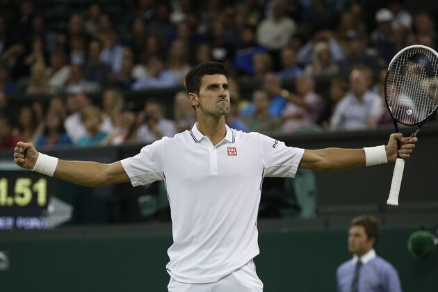 Novak Djokovic of Serbia celebrates defeating Jo-Wilfried Tsonga of France in their men's singles match at the All England Lawn Tennis Championships in Wimbledon, London, Monday, June 30, 2014. (AP Photo/Pavel Golovkin) Novak Djokovic of Serbia celebrates defeating Jo-Wilfried Tsonga of France in their men's singles match at the All England Lawn Tennis Championships in Wimbledon, London, Monday, June 30, 2014. (AP Photo/Pavel Golovkin)