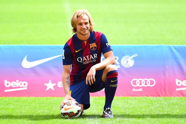 BARCELONA, SPAIN - JULY 01:  Ivan Rakitic poses as a new player for FC Barcelona at the Camp Nou stadium on July 1, 2014 in Barcelona, Spain.  (Photo by David Ramos/Getty Images)
