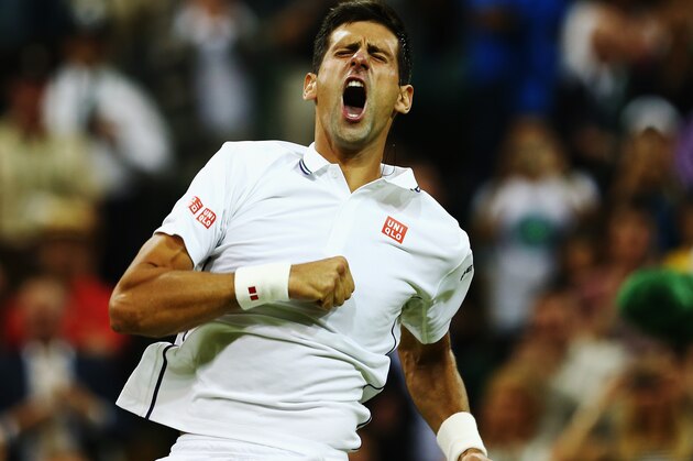 LONDON, ENGLAND - JUNE 30:  Novak Djokovic of Serbia celebrates winning his Gentlemen's Singles fourth round match against Jo-Wilfried Tsonga of France on day seven of the Wimbledon Lawn Tennis Championships at the All England Lawn Tennis and Croquet Club on June 30, 2014 in London, England.  (Photo by Clive Brunskill/Getty Images)