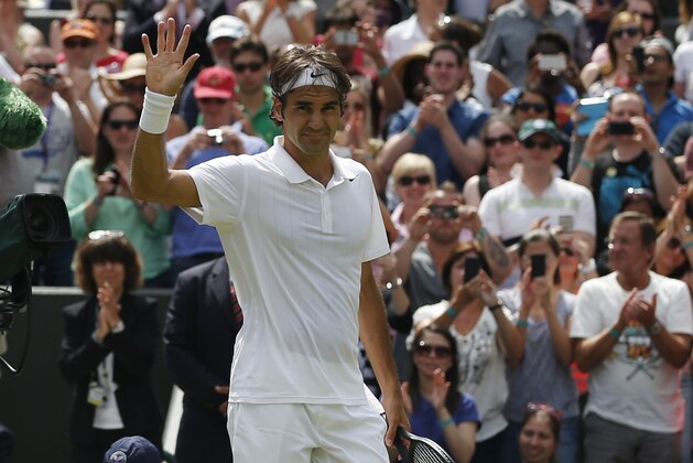 Roger Federer of Switzerland celebrates defeating Tommy Robredo of Spain in their men's singles match at the All England Lawn Tennis Championships in Wimbledon, London, Tuesday July 1, 2014. (AP Photo/Pavel Golovkin) Roger Federer of Switzerland celebrates defeating Tommy Robredo of Spain in their men's singles match at the All England Lawn Tennis Championships in Wimbledon, London, Tuesday July 1, 2014. (AP Photo/Pavel Golovkin)