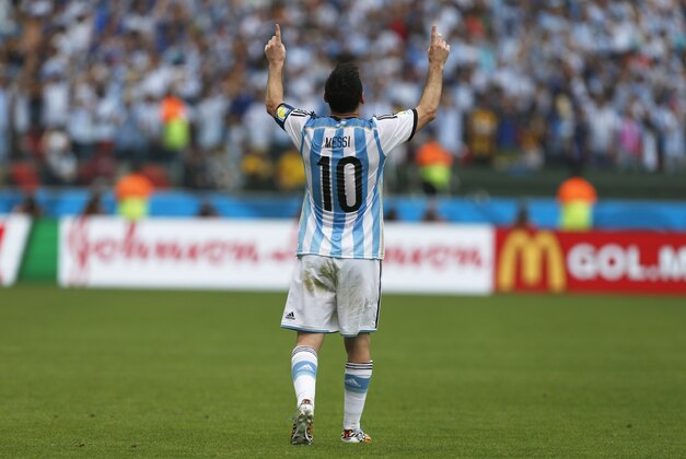 Argentina's Lionel Messi celebrates after scoring his side's second goal during the group F World Cup soccer match against Nigeria at the Estadio Beira-Rio in Porto Alegre, Brazil, Wednesday, June 25, 2014. (AP Photo/Jon Super)