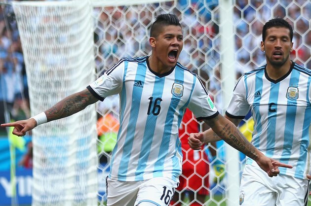 PORTO ALEGRE, BRAZIL - JUNE 25: Marcos Rojo of Argentina celebrates scoring his team's third goal during the 2014 FIFA World Cup Brazil Group F match between Nigeria and Argentina at Estadio Beira-Rio on June 25, 2014 in Porto Alegre, Brazil. (Photo by Jeff Gross/Getty Images) PORTO ALEGRE, BRAZIL - JUNE 25: Marcos Rojo of Argentina celebrates scoring his team's third goal during the 2014 FIFA World Cup Brazil Group F match between Nigeria and Argentina at Estadio Beira-Rio on June 25, 2014 in Porto Alegre, Brazil. (Photo by Jeff Gross/Getty Images)