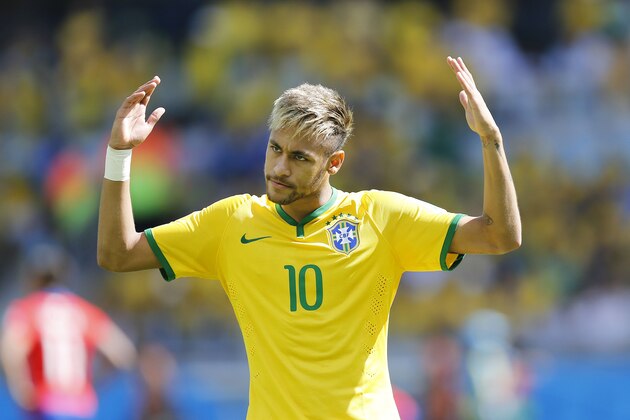 Brazil's Neymar encourages fans for their support before the World Cup round of 16 soccer match between Brazil and Chile at the Mineirao Stadium in Belo Horizonte, Brazil, Saturday, June 28, 2014. (AP Photo/Frank Augstein)