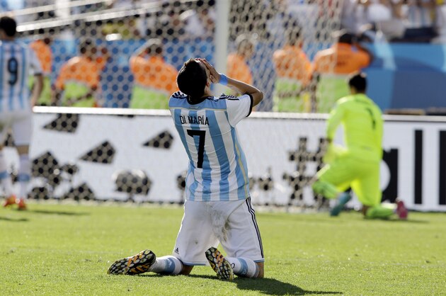 Argentina's Angel di Maria reacts after missing a chance to score during the World Cup round of 16 soccer match between Argentina and Switzerland at the Itaquerao Stadium in Sao Paulo, Brazil, Tuesday, July 1, 2014. Argentina beat Switzerland 1-0 after extra time.(AP Photo/Kirsty Wigglesworth)