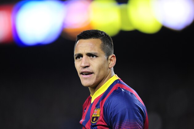 FC Barcelona's Alexis Sanchez, from Chile, reacts against Rayo Vallecano during a Spanish La Liga soccer match at the Camp Nou stadium in Barcelona, Spain, Saturday, Feb. 15, 2014. (AP Photo/Manu Fernandez)