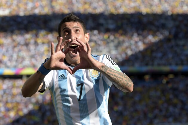 Argentina's Angel di Maria celebrates after scoring his side's only and winning goal in extra time during the World Cup round of 16 soccer match between Argentina and Switzerland at the Itaquerao Stadium in Sao Paulo, Brazil, Tuesday, July 1, 2014. Argentina defeated Switzerland 1-0 to move on to the quarterfinals. (AP Photo/Manu Fernandez) Argentina's Angel di Maria celebrates after scoring his side's only and winning goal in extra time during the World Cup round of 16 soccer match between Argentina and Switzerland at the Itaquerao Stadium in Sao Paulo, Brazil, Tuesday, July 1, 2014. Argentina defeated Switzerland 1-0 to move on to the quarterfinals. (AP Photo/Manu Fernandez)