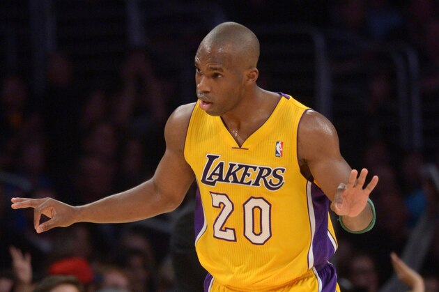 Apr 4, 2014; Los Angeles, CA, USA; Los Angeles Lakers guard Jodie Meeks (20) reacts after a 3-point basket against the Dallas Mavericks at Staples Center. Mandatory Credit: Kirby Lee-USA TODAY Sports
