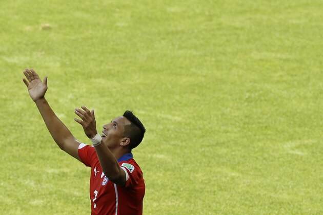 Chile's Alexis Sanchez celebrates scoring his side's first goal during the World Cup round of 16 soccer match between Brazil and Chile at the Mineirao Stadium in Belo Horizonte, Brazil, Saturday, June 28, 2014. (AP Photo/Hassan Ammar)